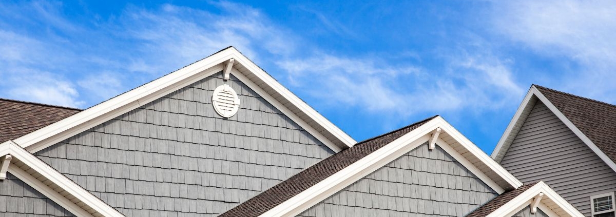 house with blue siding and white gutters - Rain Master Seamless Gutters Seamless Gutter Installation Near Burnsville