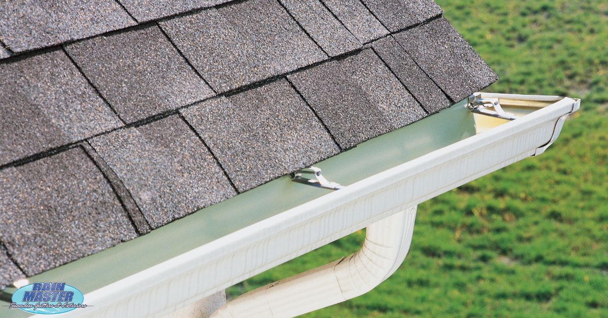 closeup of room with white gutters - Rain Master Seamless Gutter Installation Near Andover