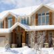 house with snow on roof and large icicles - Rain Master seamless gutters