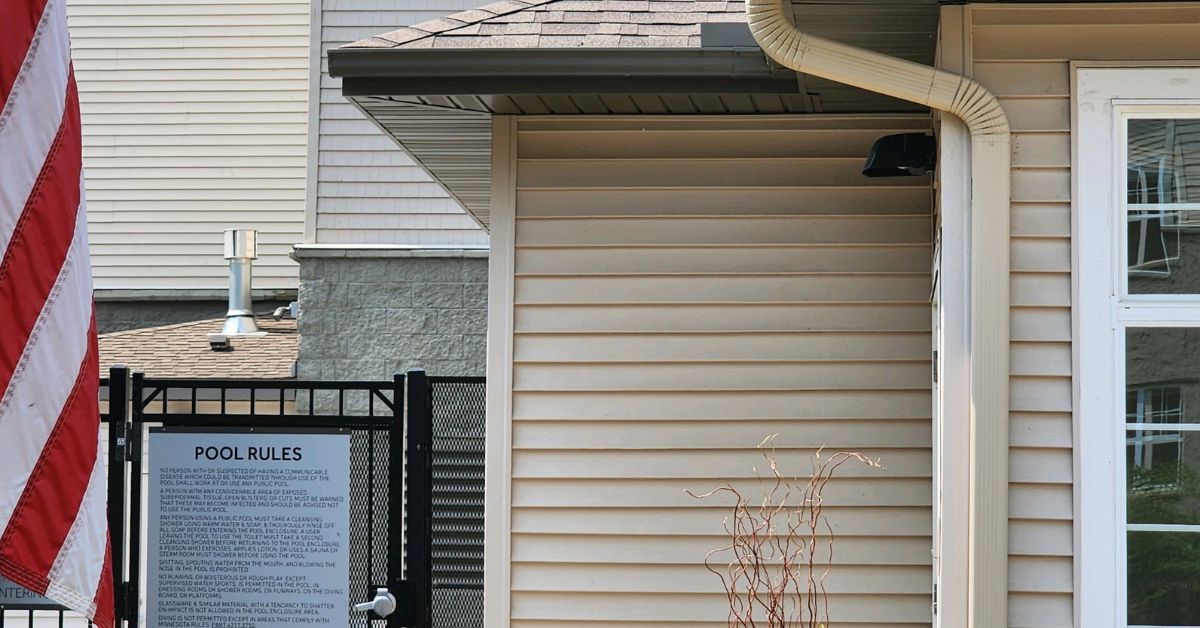 brown building with installed seamless gutters - Rain Master seamless gutter installation near Apple Valley