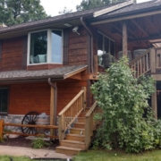 house with brown seamless gutters - Rain Master seamless gutters