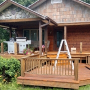 brown seamless gutters on a house with a front porch - Rain Master seamless gutter installation near Brooklyn Park