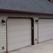 house beige siding and dark brown seamless gutters - Rain Master seamless gutter installation near Belle Plaine