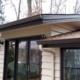 house beige siding and dark brown seamless gutters - Rain Master seamless gutter installation near Champlin