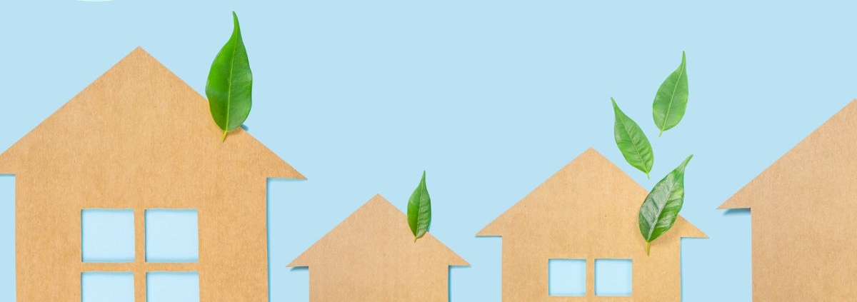 blue background with green leaves and paper cut outs of houses - Rain Master seamless gutters