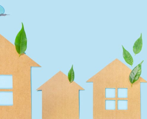 blue background with green leaves and paper cut outs of houses - Rain Master seamless gutters