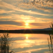 RainMasterSeamlessGutters-seamless-gutter-installation-near-centerville lake front during sunset -Rain Master Seamless Gutters seamless gutter installation near Centerville