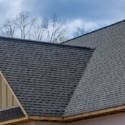 close up of a roof with grey shingles - Rain Master seamless gutter installation