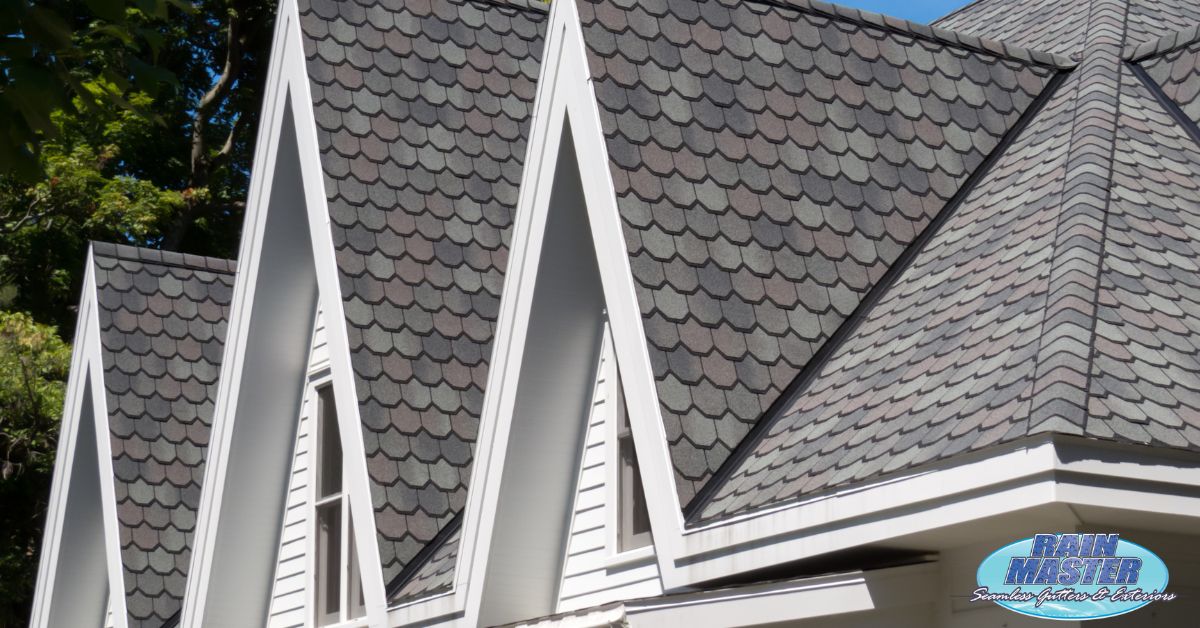close up of a roof with grey shingles - Rain Master seamless gutter installation
