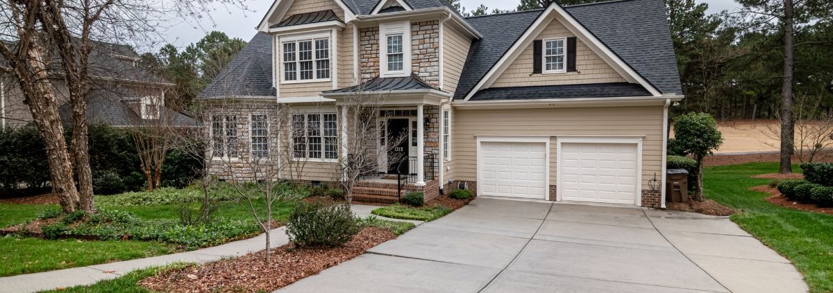 close up of a roof with grey shingles - Rain Master seamless gutters