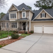 close up of a roof with grey shingles - Rain Master seamless gutters