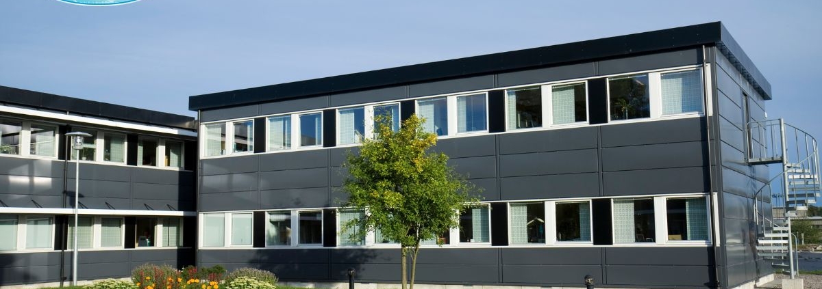 exterior of a commercial office building - Rain Master Seamless Gutters