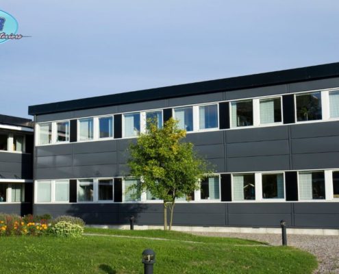 exterior of a commercial office building - Rain Master Seamless Gutters