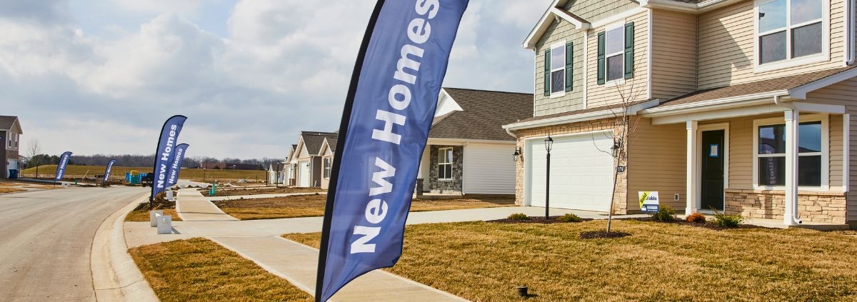 exterior of new homes in a neighborhood - Rain Master gutter installation