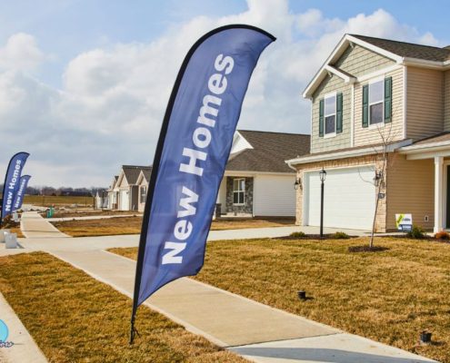 exterior of new homes in a neighborhood - Rain Master gutter installation