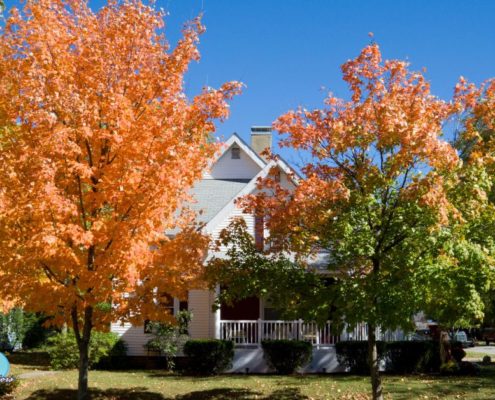 exterior of a home in the fall time - Rain Master