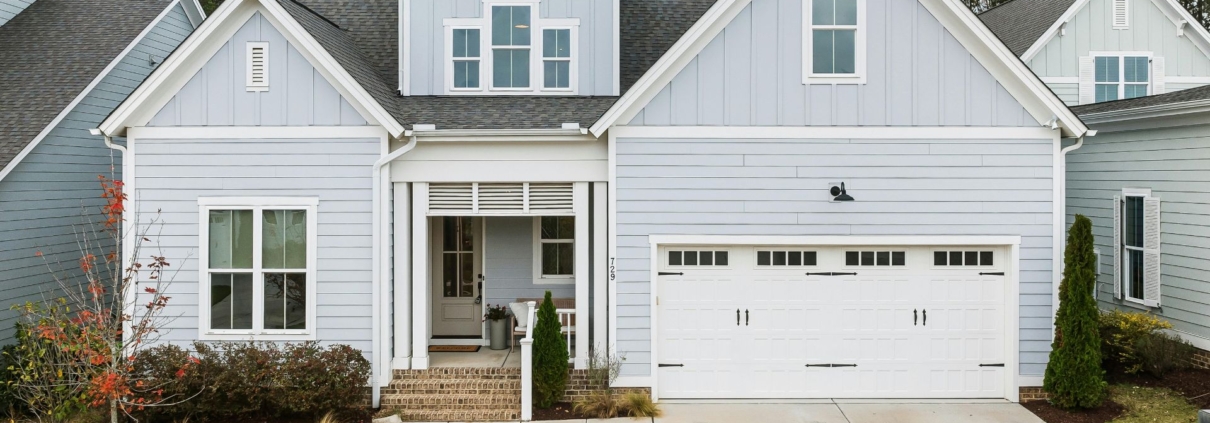 exterior of a newly built home - Rain Master Seamless Gutters Color-Matched Gutters