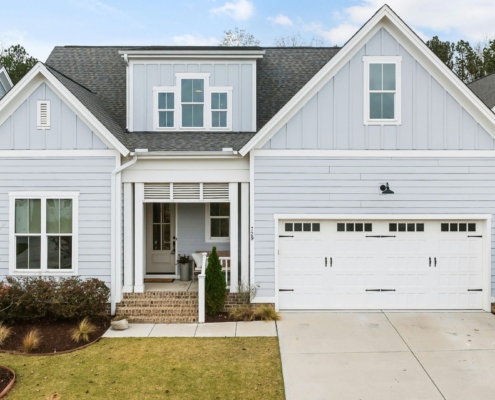 exterior of a newly built home - Rain Master Seamless Gutters Color-Matched Gutters