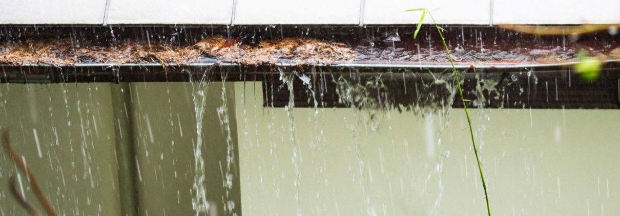 overflowing gutters in a rain storm - Rain Master overflowing gutters