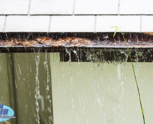 overflowing gutters in a rain storm - Rain Master overflowing gutters