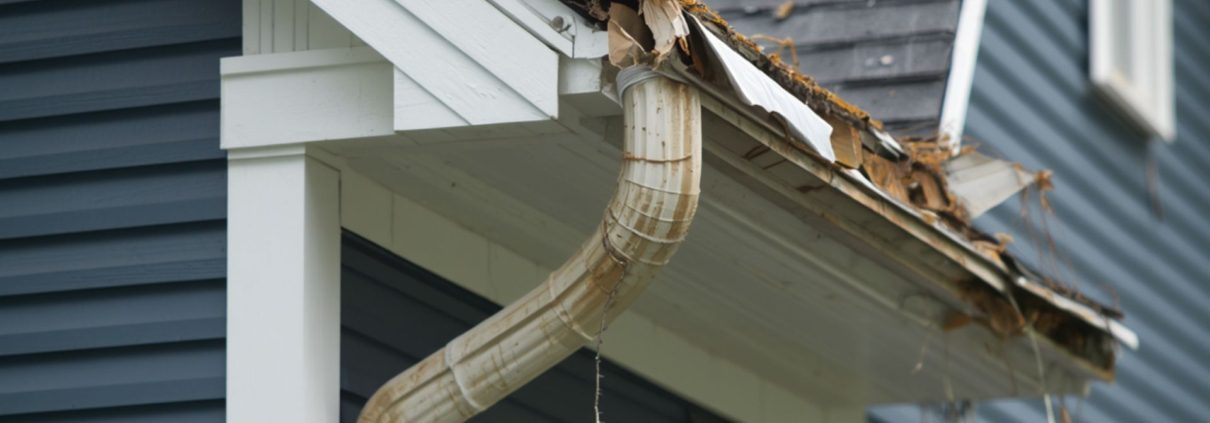 exterior of a home with significant gutter damage - Rain Master Seamless Gutters insurance claims for gutter damage in Minnesota