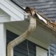 exterior of a home with significant gutter damage - Rain Master Seamless Gutters insurance claims for gutter damage in Minnesota
